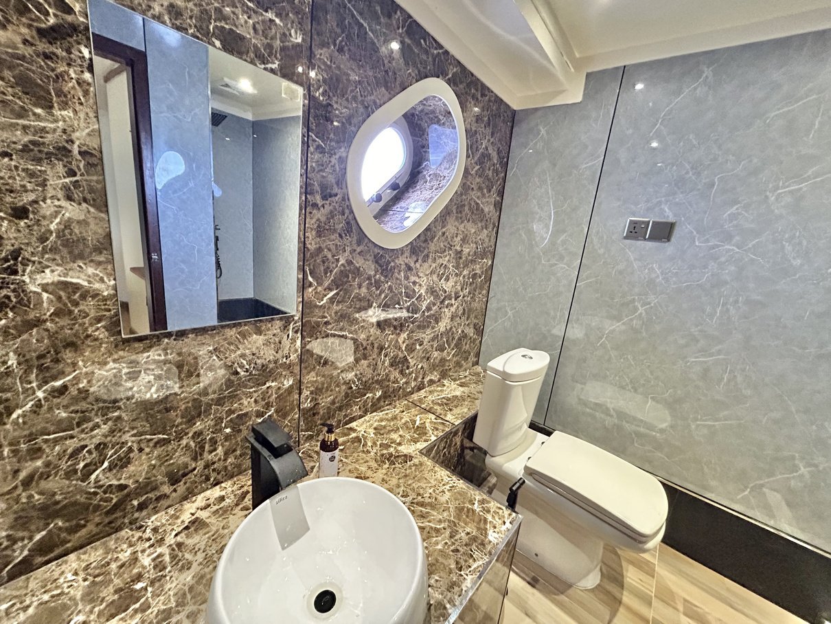 Private bathroom with marble details